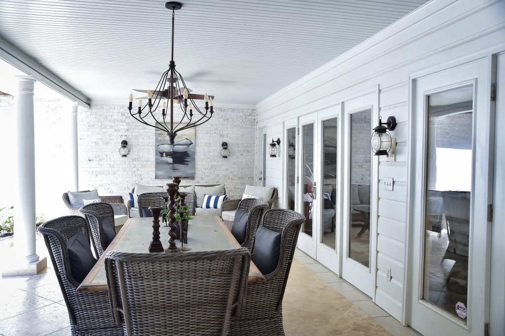 Outdoor/indoor living space. Outdoor covered patio with entertainment space for summer.